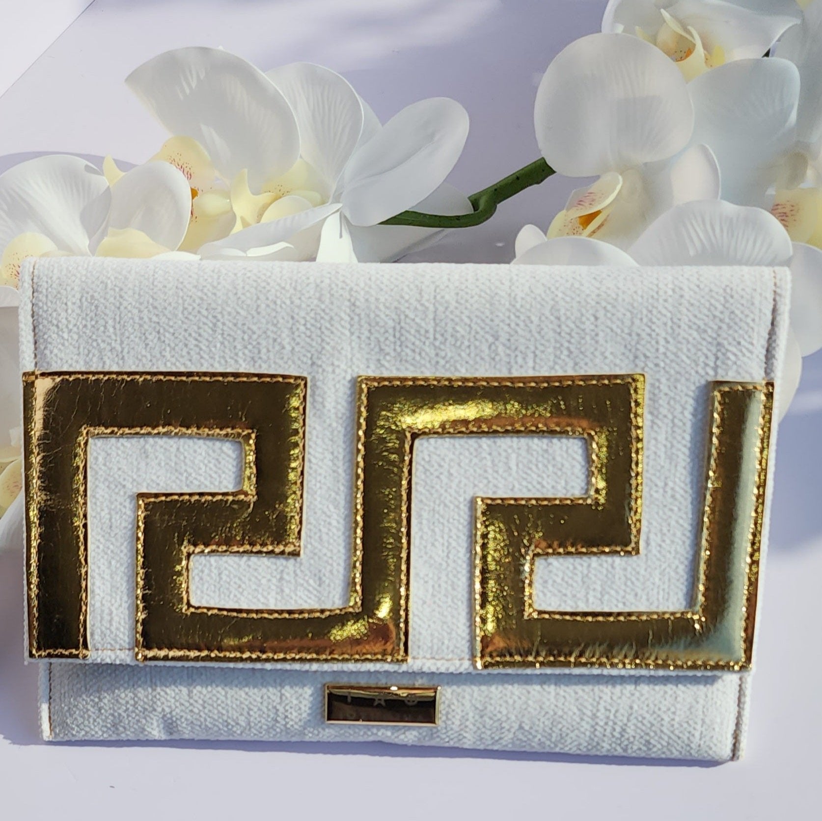 Ikarus Cream Clutch Bag by Iosifina