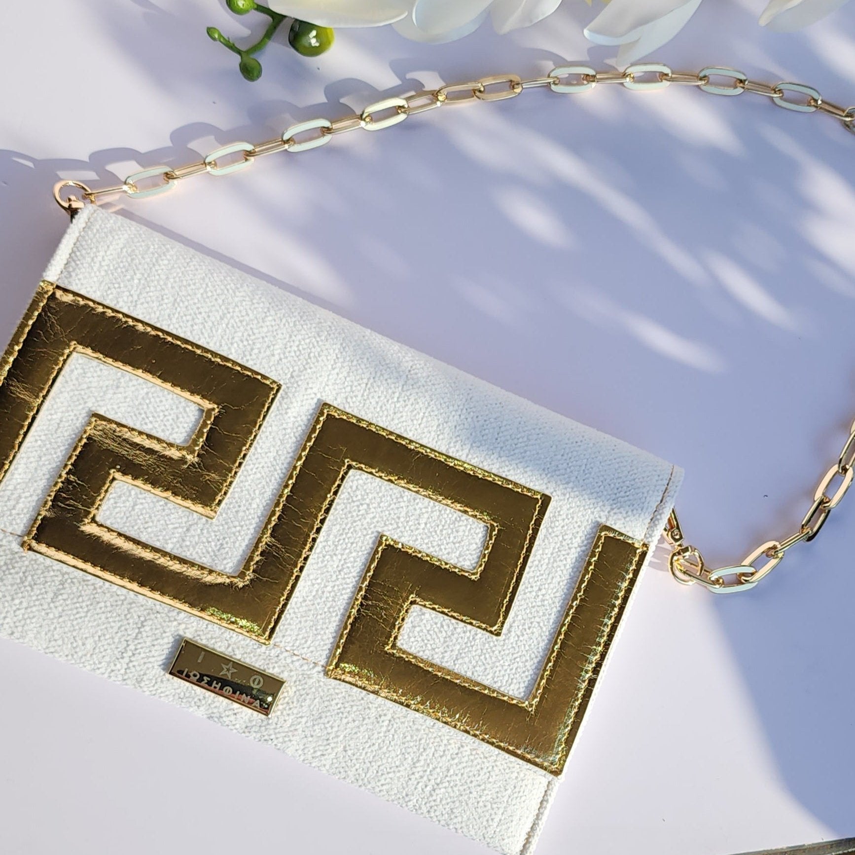 Ikarus Cream Clutch Bag by Iosifina