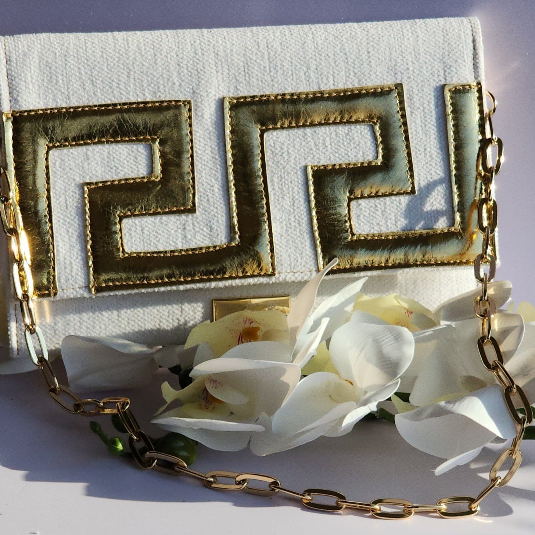 Ikarus Cream Clutch Bag by Iosifina