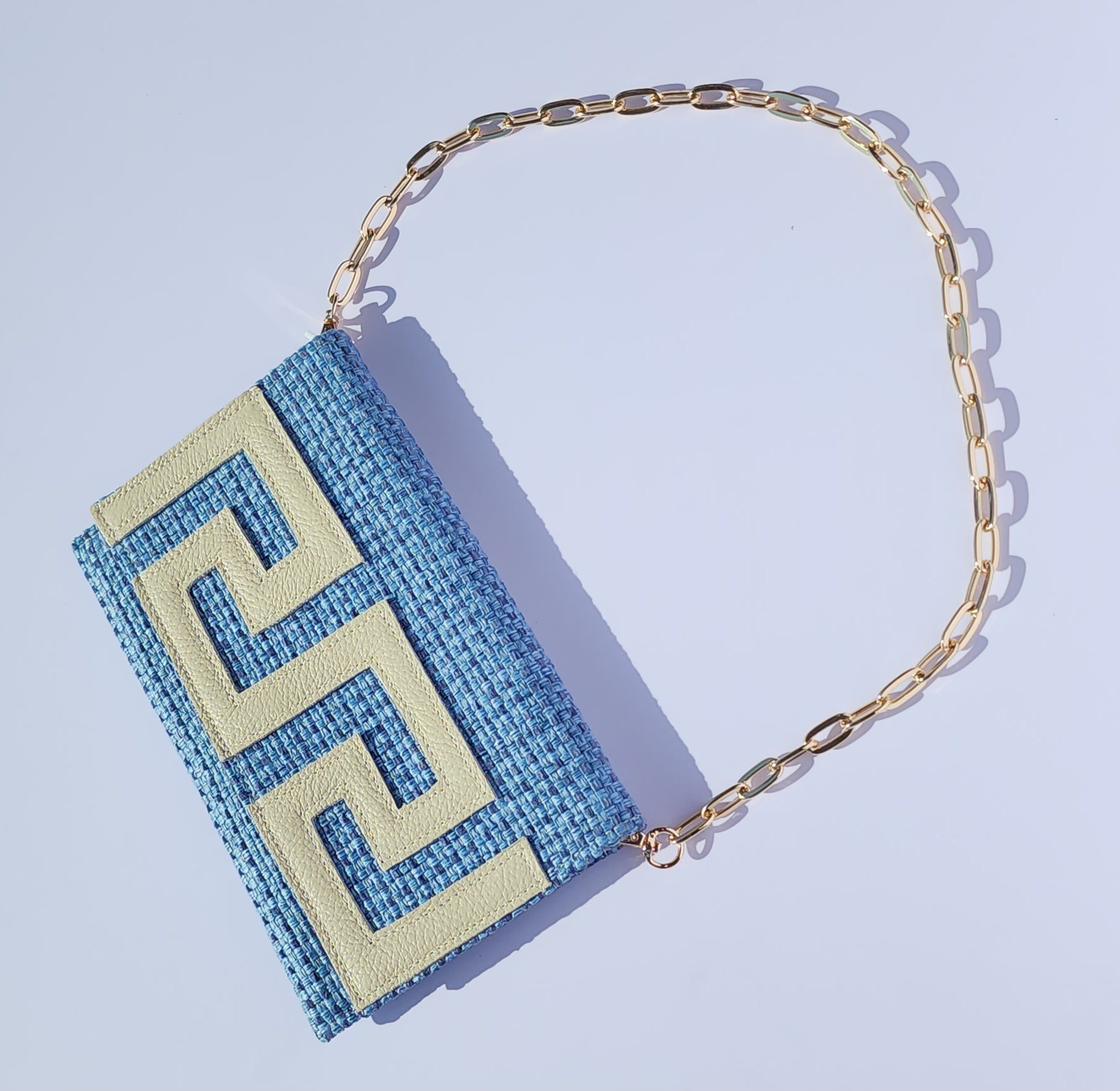 Ikarus Blue Clutch Bag by Iosifina