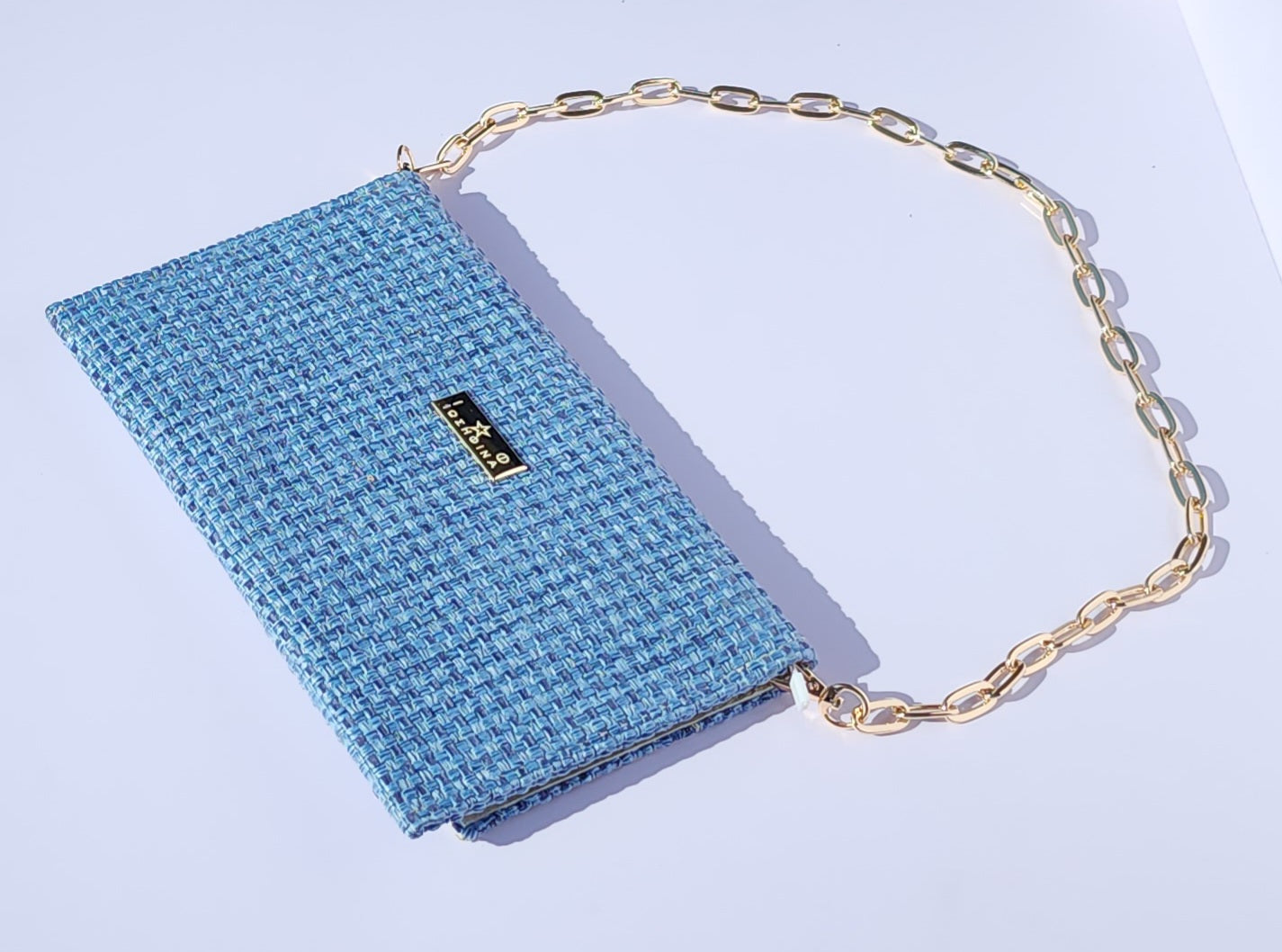 Ikarus Blue Clutch Bag by Iosifina